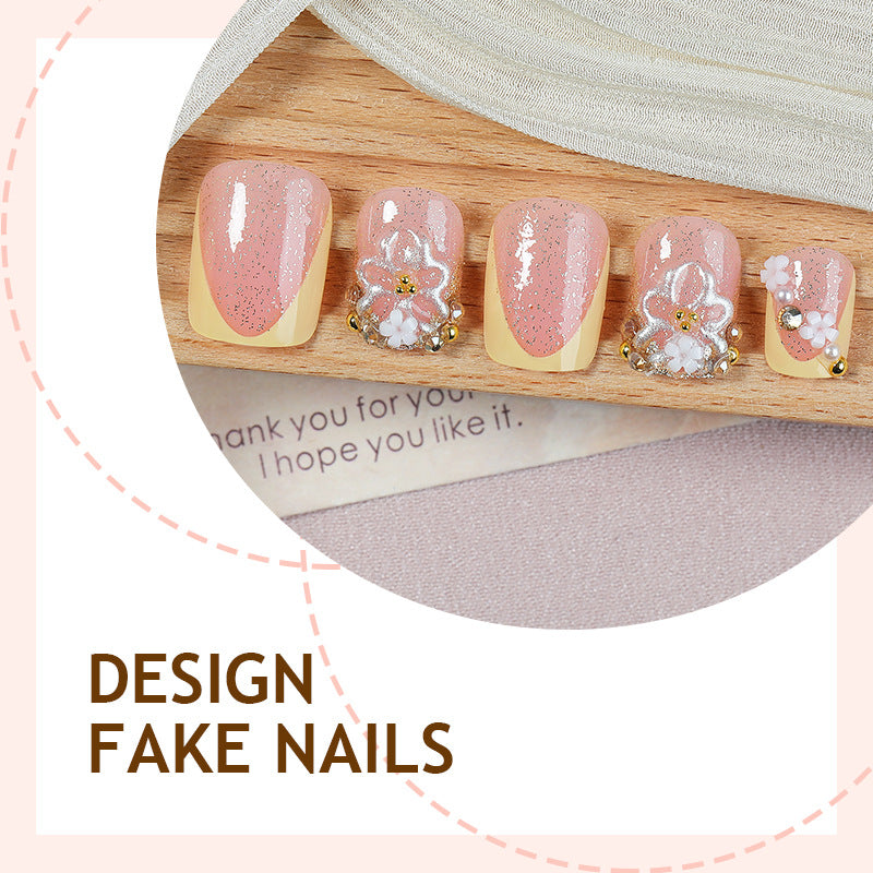 Nail art set with glamorous glitter and flower accents Bowlift