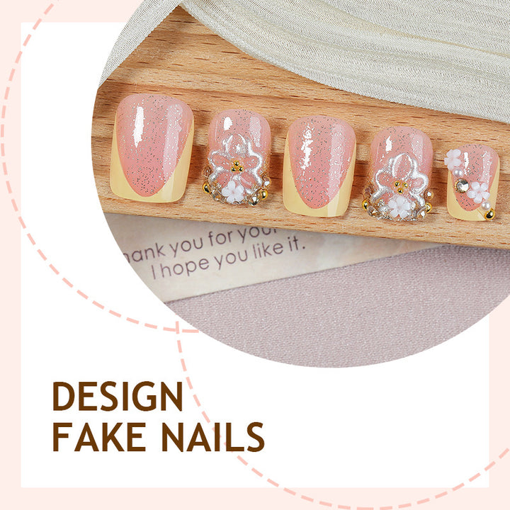 Nail art set with glamorous glitter and flower accents Bowlift