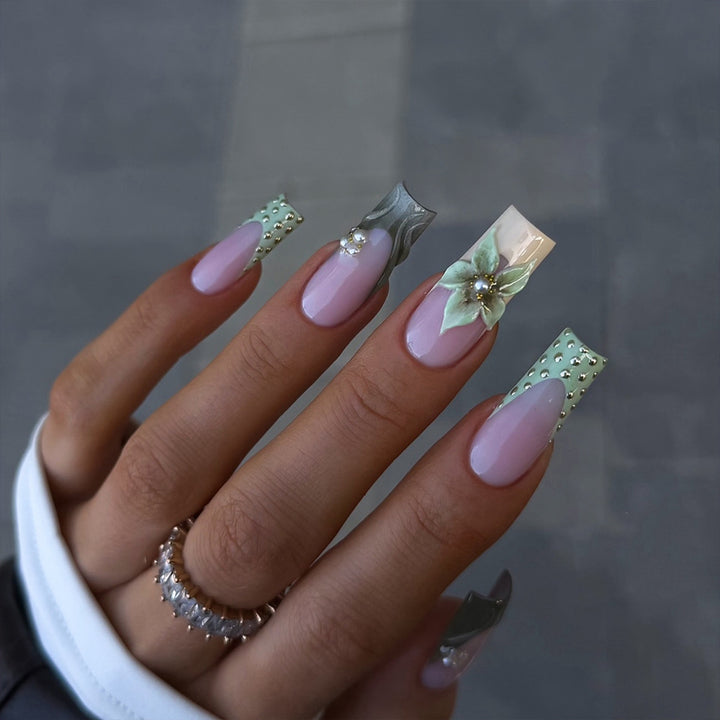 Creative acrylic nails with 3D floral design Bowlift