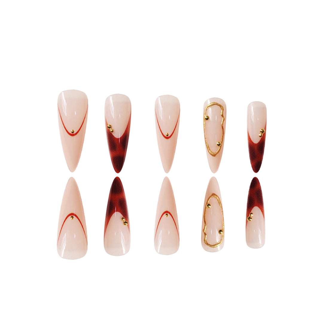 Stiletto Press-On Nail Art Set with Elegant Gold Accents Bowlift