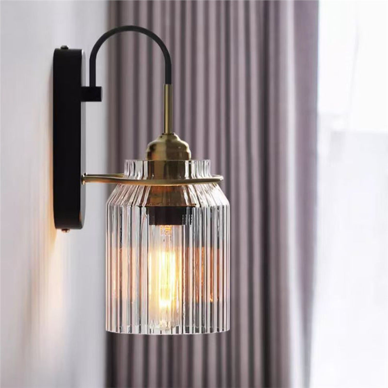 Ribbed Glass Wall Sconce with Curved Arm and Edison Bulb Compatibility Bowlift