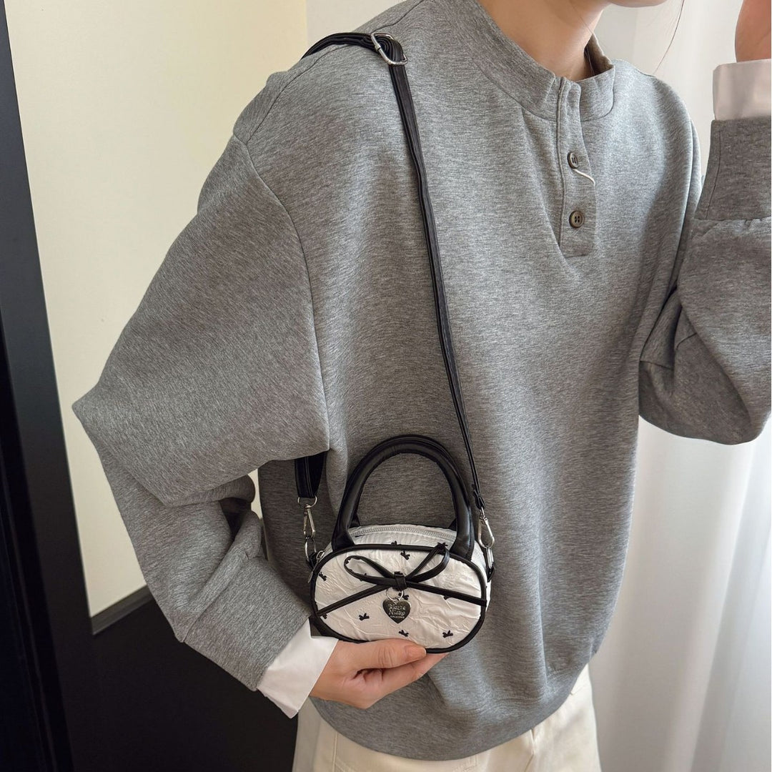 Quilted Mini Handbag with Heart Detail Bowlift