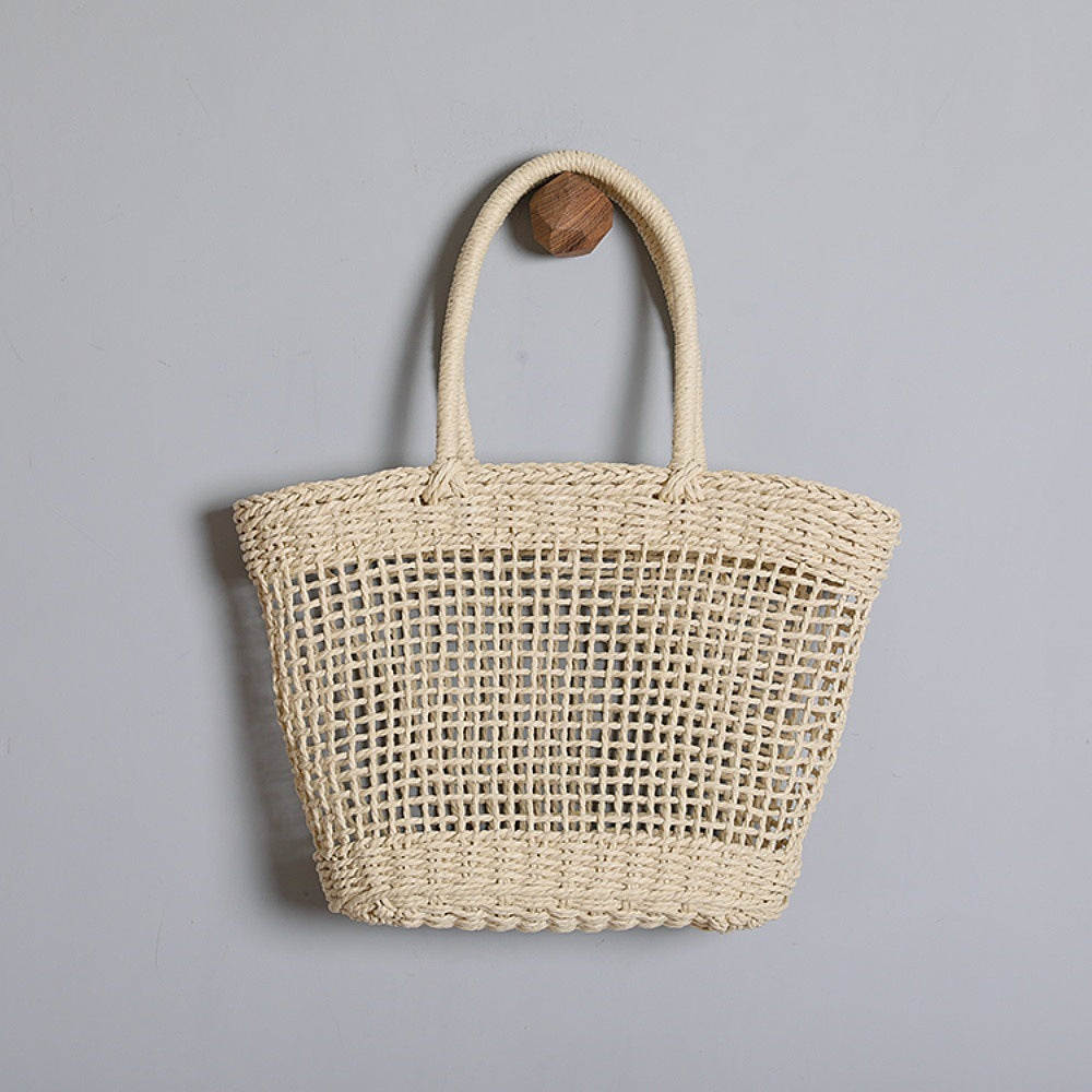 Basket bag made of natural raffia with sturdy carrying handles Bowlift