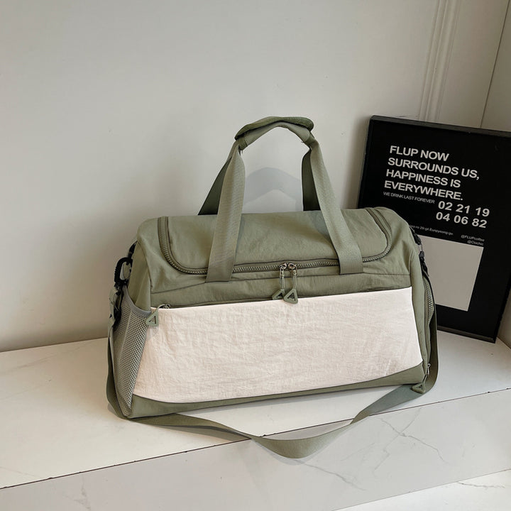 Sporty travel bag with sturdy carrying handles Bowlift