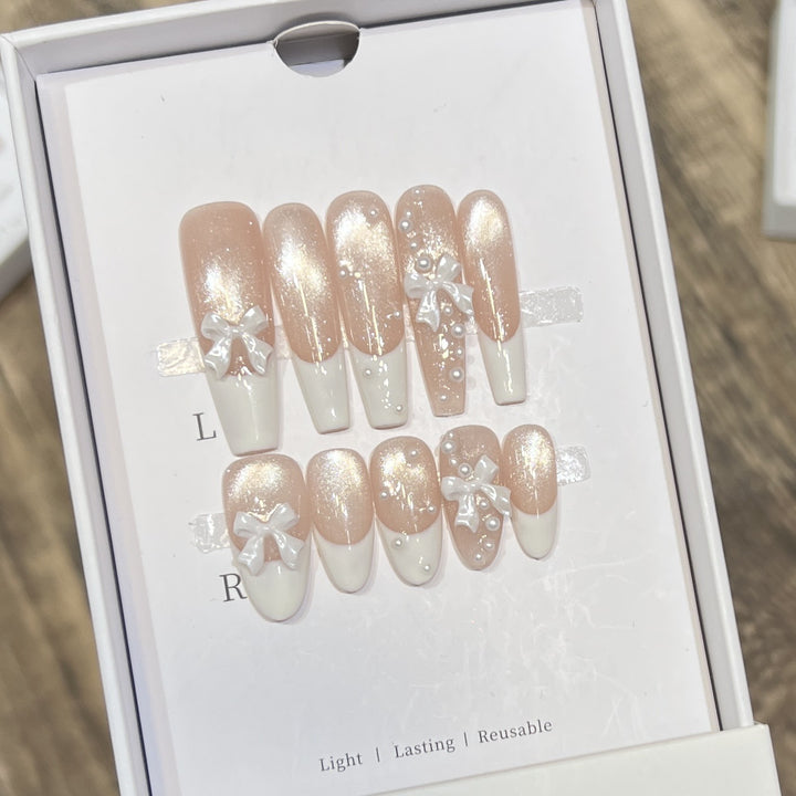 Decorative Long Press-On Nail Set with Bow and Pearl Accents Bowlift