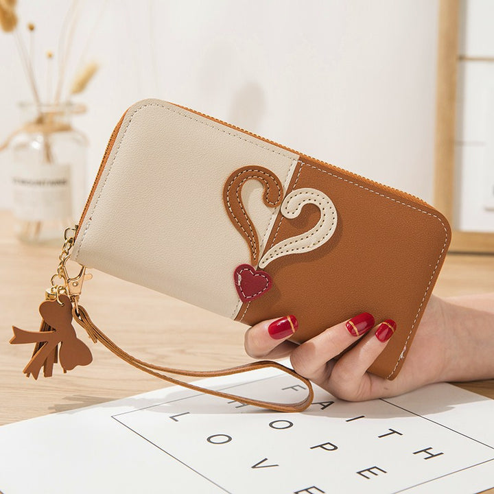 Stylish wallet with heart appliqués Bowlift
