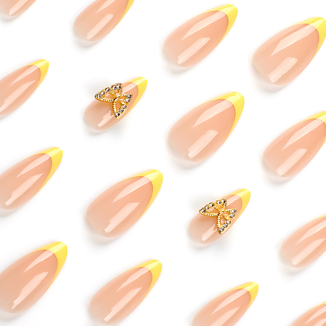 Artful stiletto nails with glamorous butterfly design Bowlift