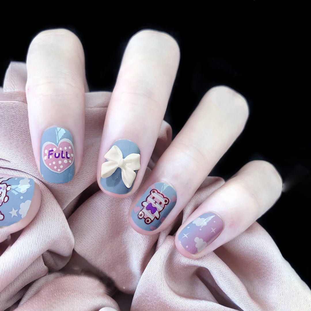 Creative nail art with bow and animal motifs Bowlift