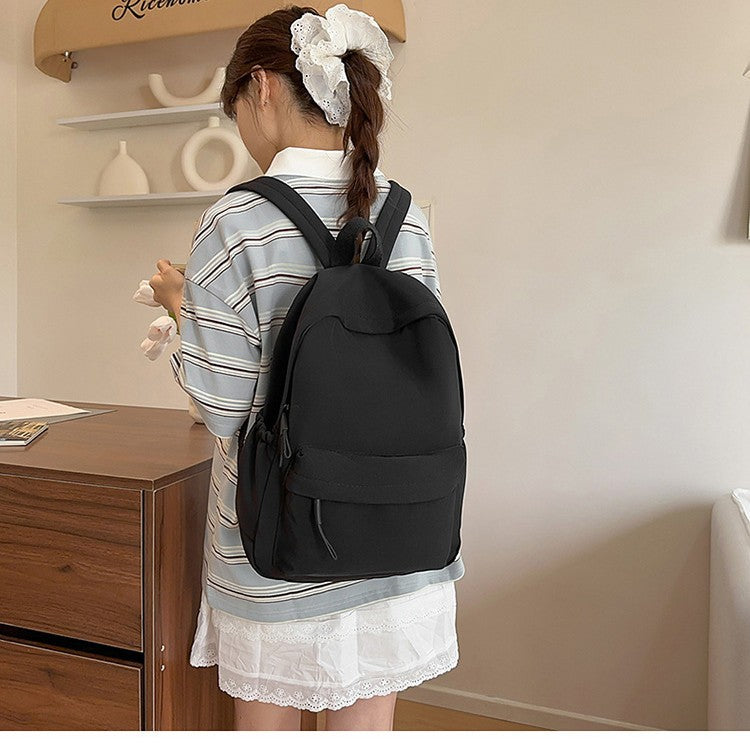 Leisure backpack with flexible side pockets and clear structure Bowlift