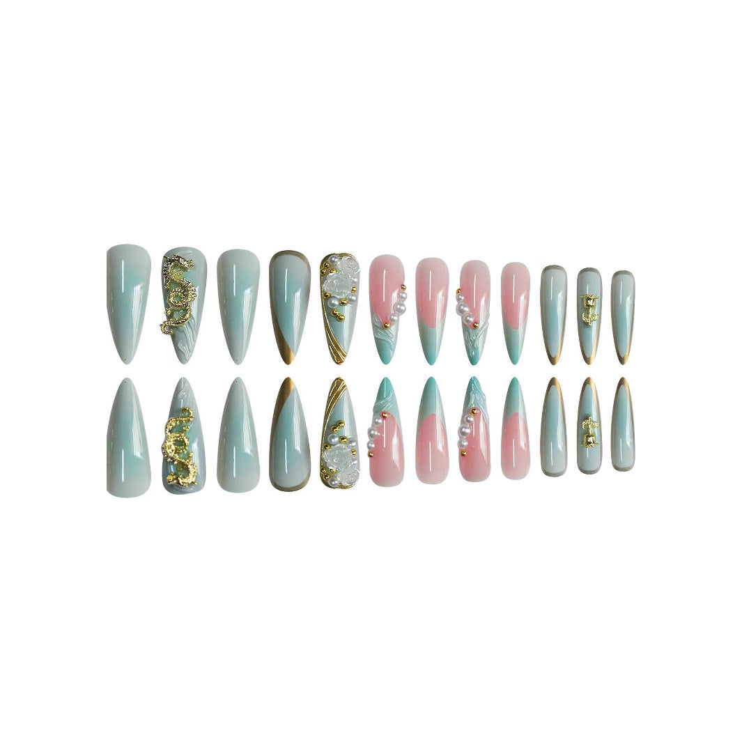 Luxurious Stiletto Nail Enhancements with Floral Accents Bowlift