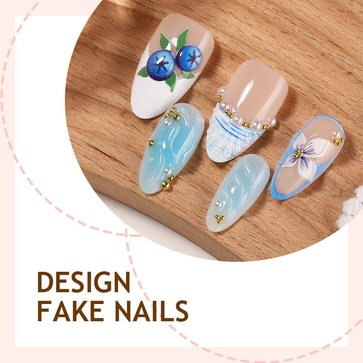 Artificial nail set with floral accents and sparkling details Bowlift