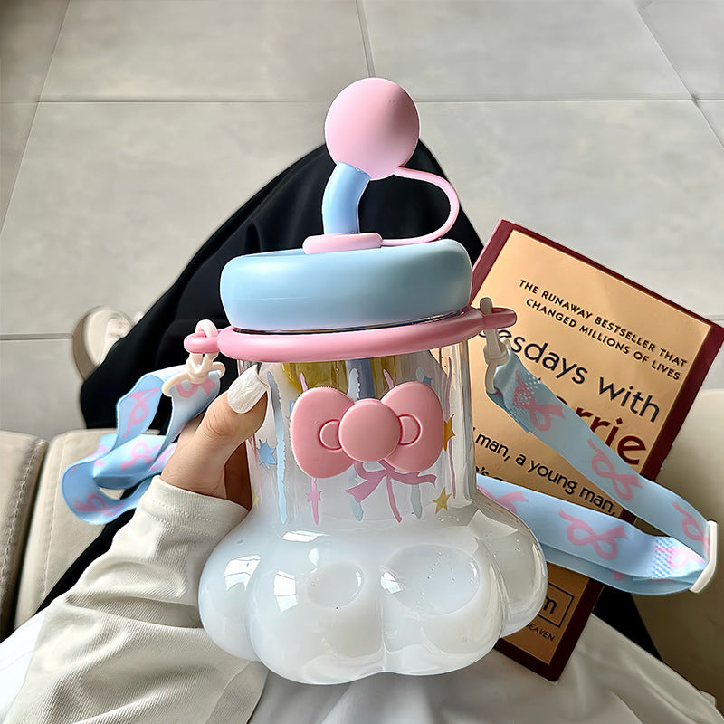 Women's water bottle with integrated silicone carrying handle and playful design Bowlift