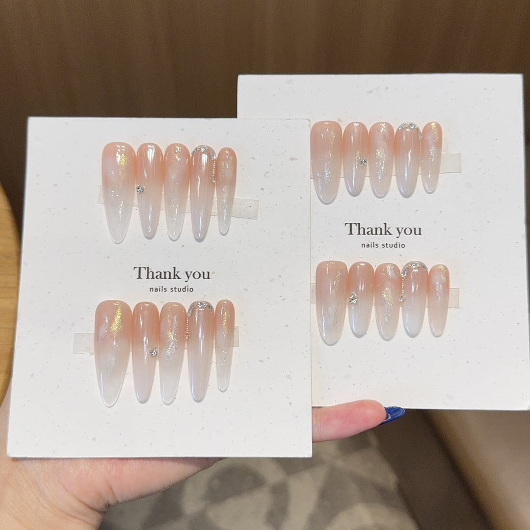 Artificial Nail Set with Elegant Glitter Accents Bowlift