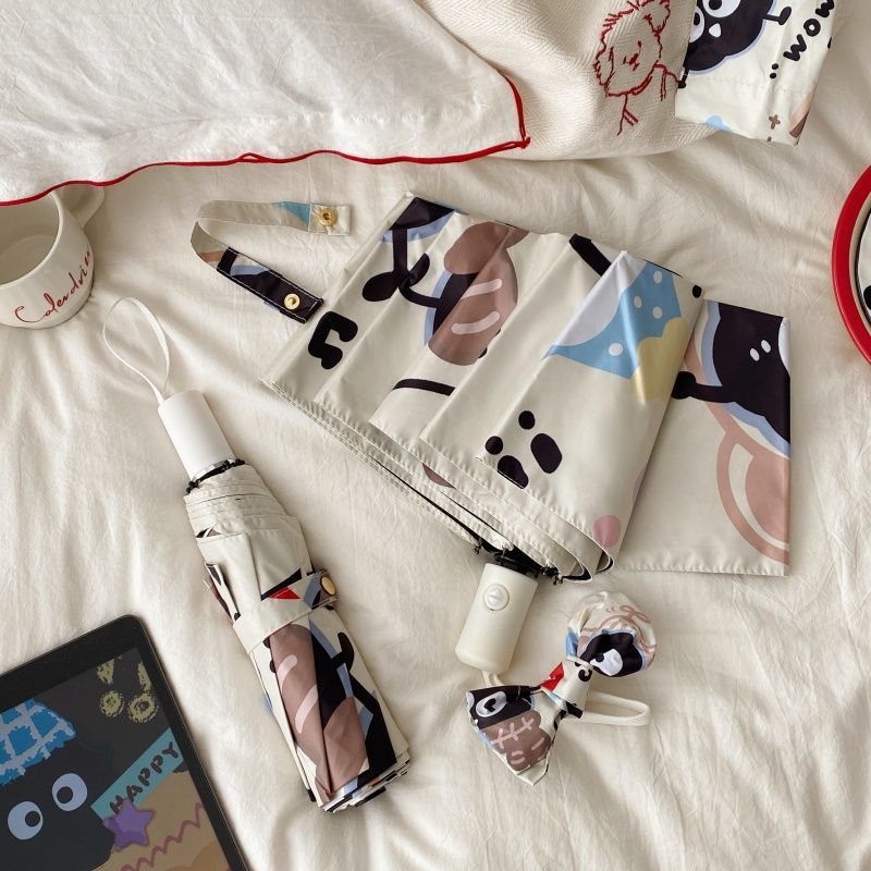 Ladies practical folding umbrella with playful design Bowlift