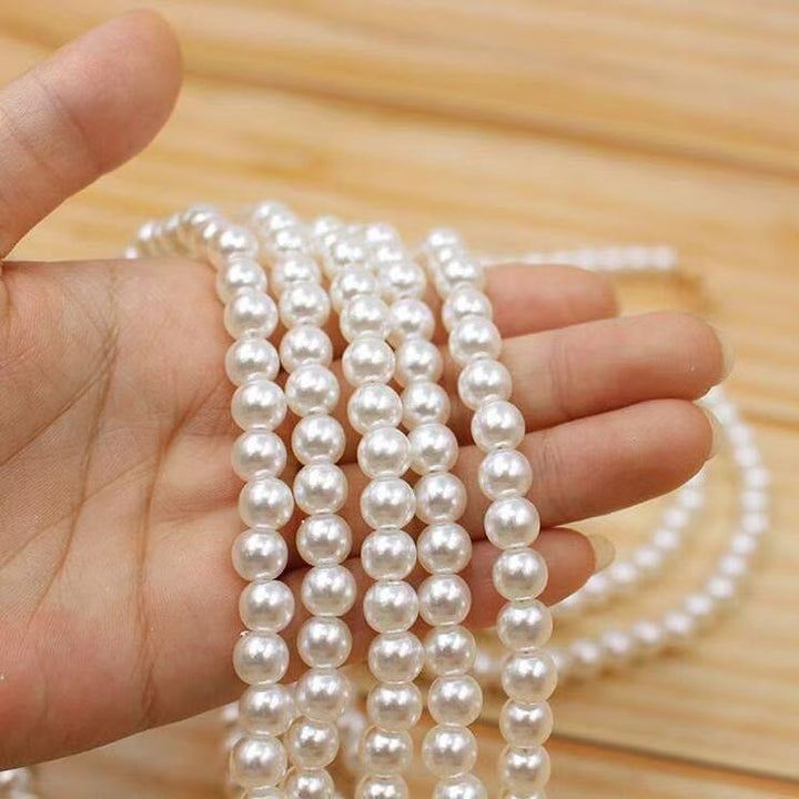 Elegant Pearl Necklace Bowlift