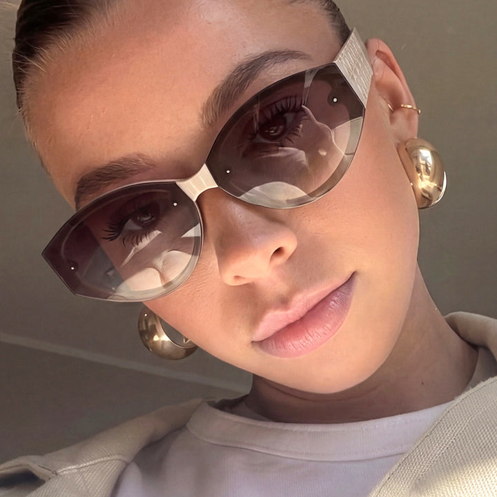 Ladies extravagant Cat-Eye sunglasses with textured frame Bowlift