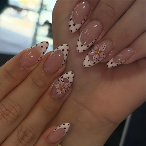 Creative artificial nails with floral design and glamorous accents Bowlift