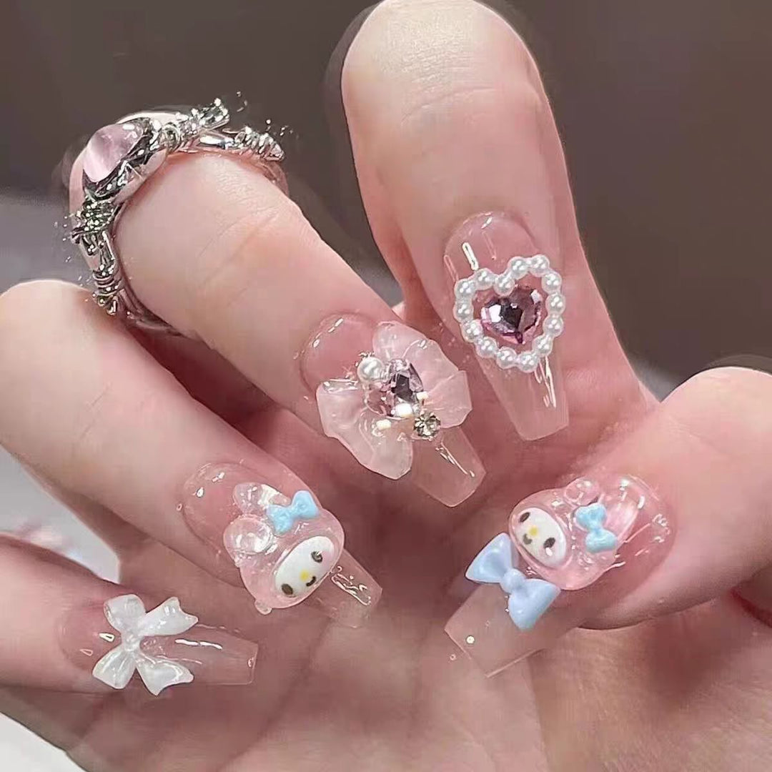 Artistic Press-On Nail Set with Floral and Glossy Accents Bowlift
