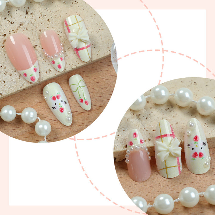 Decorative Press-On Nail Set with Floral and Whimsical Designs Bowlift