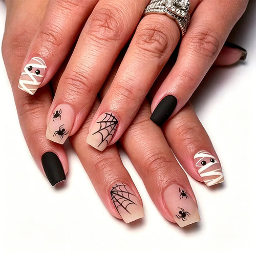 Artificial nail set with creepy Halloween motif and delicate spider designs Bowlift