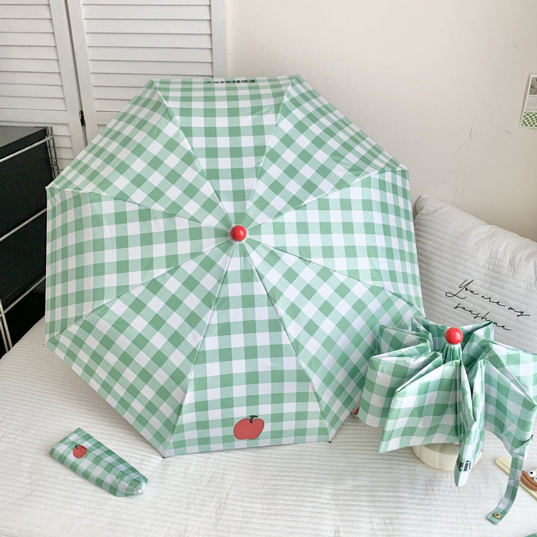 Ladies' folding umbrella in stylish check pattern with fruity motif Bowlift