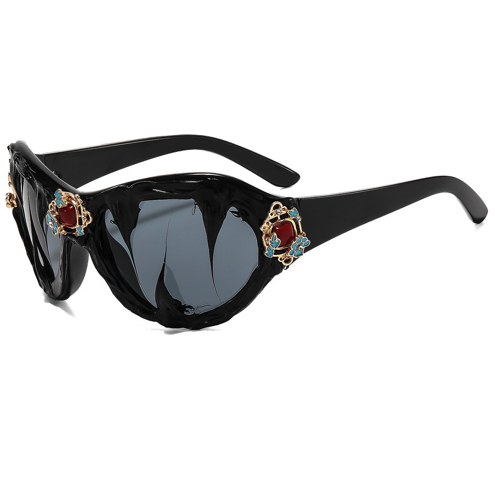 Ladies extravagant sunglasses with floral crystal embellishments Bowlift