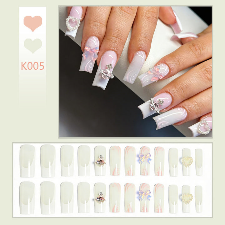Artificial nails with delicate embellishments Bowlift