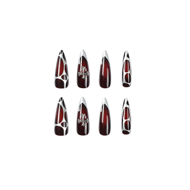 Artful Stiletto Nails with Elegant Cross Decoration Bowlift