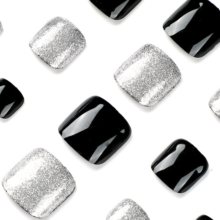 Artful toenail art with glitter and black design Bowlift