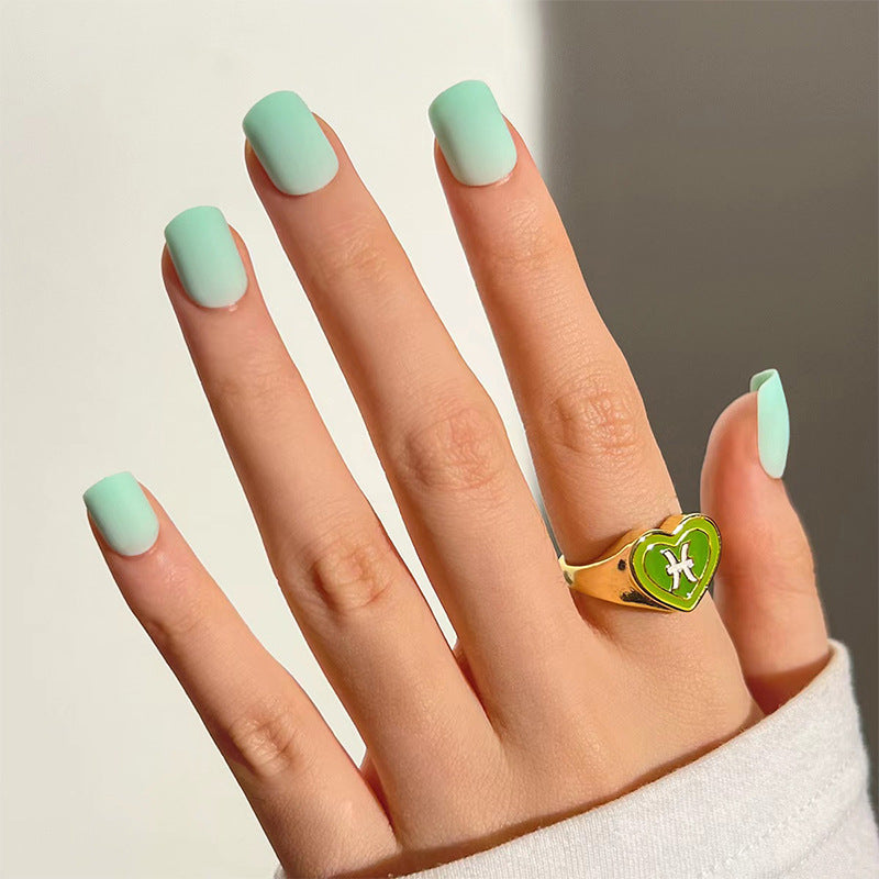 Fashionable nail art with matte finish and heart design Bowlift