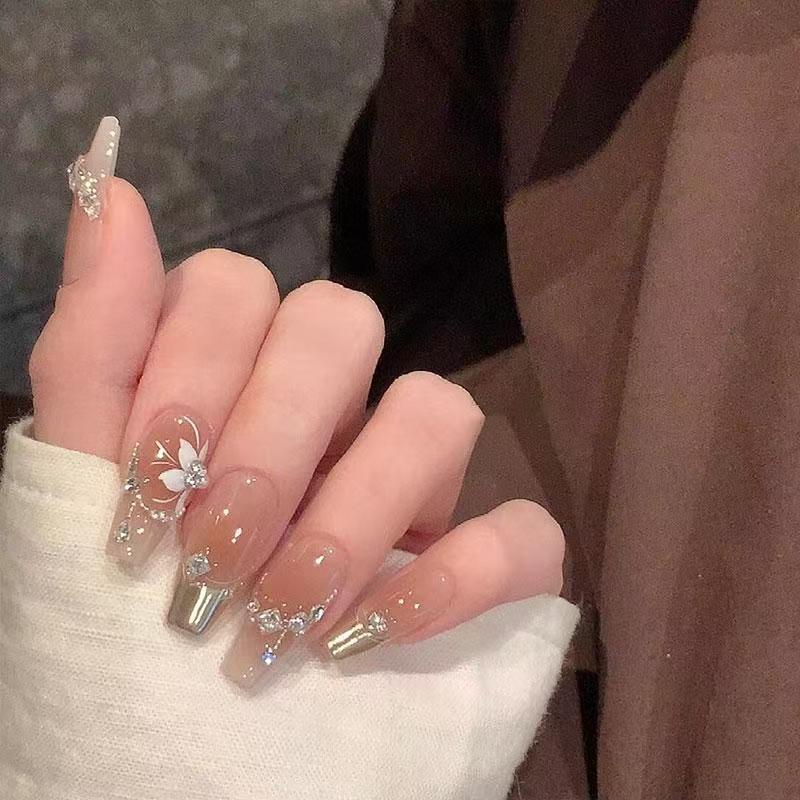 Elegant Press-On Nail Art with Floral and Gemstone Details Bowlift