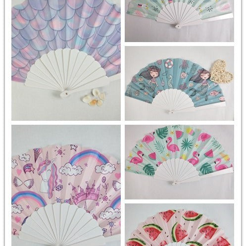 Women folding hand fan with shimmering scale pattern Bowlift