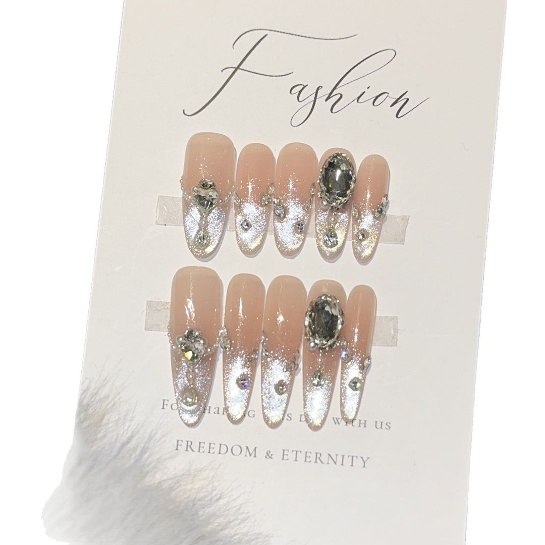 Glamorous artificial nail tips with rhinestone accents Bowlift