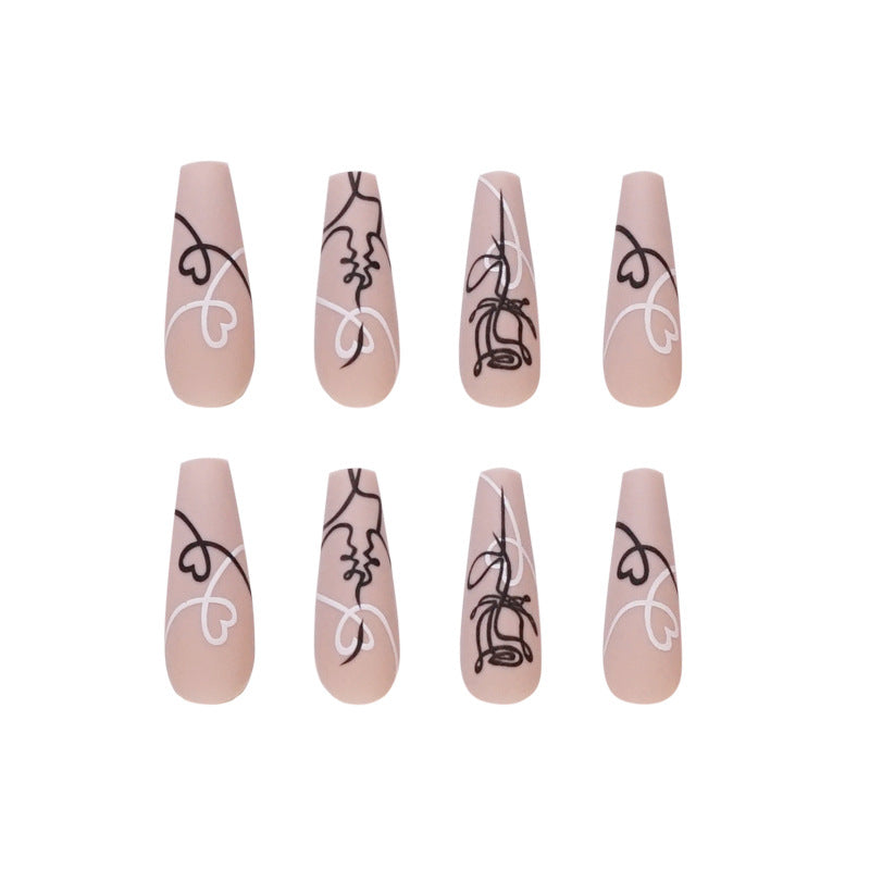 Artful nail extensions with creative line and heart design Bowlift