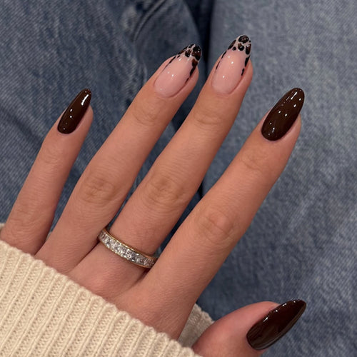 Artful stiletto nails with elegant design and glossy finish Bowlift