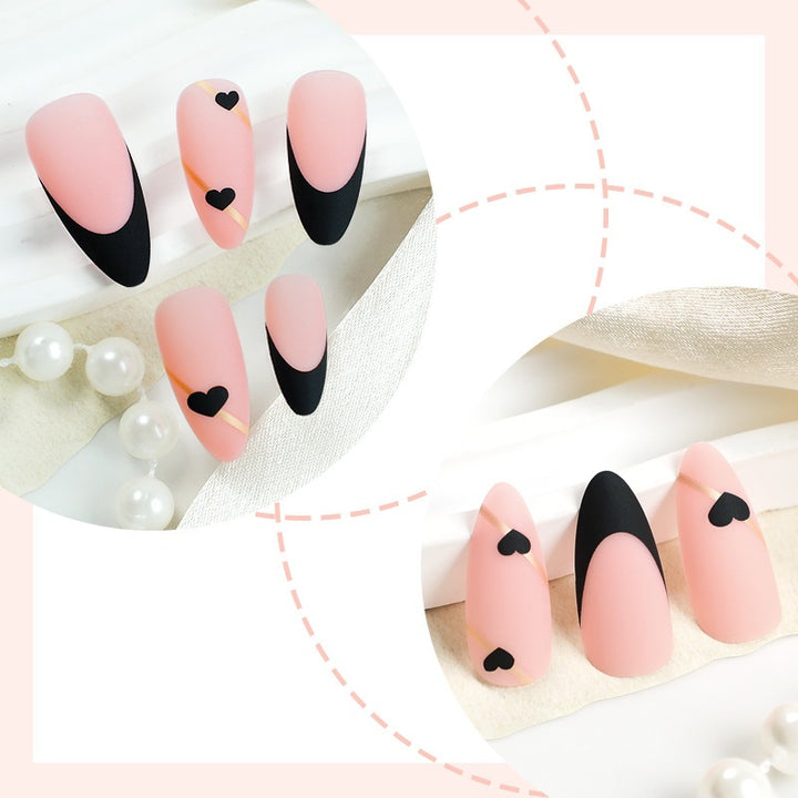 Creative nail art set with heart-shaped accents and elegant French tips Bowlift