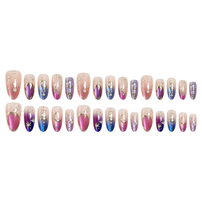 Glamorous artificial nails with star and moon motifs Bowlift