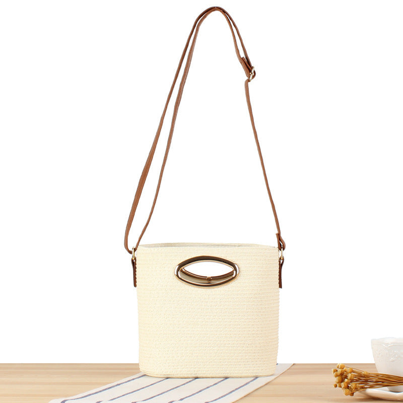 Shoulder bag made of hand-woven natural material with elegant ring closure Bowlift