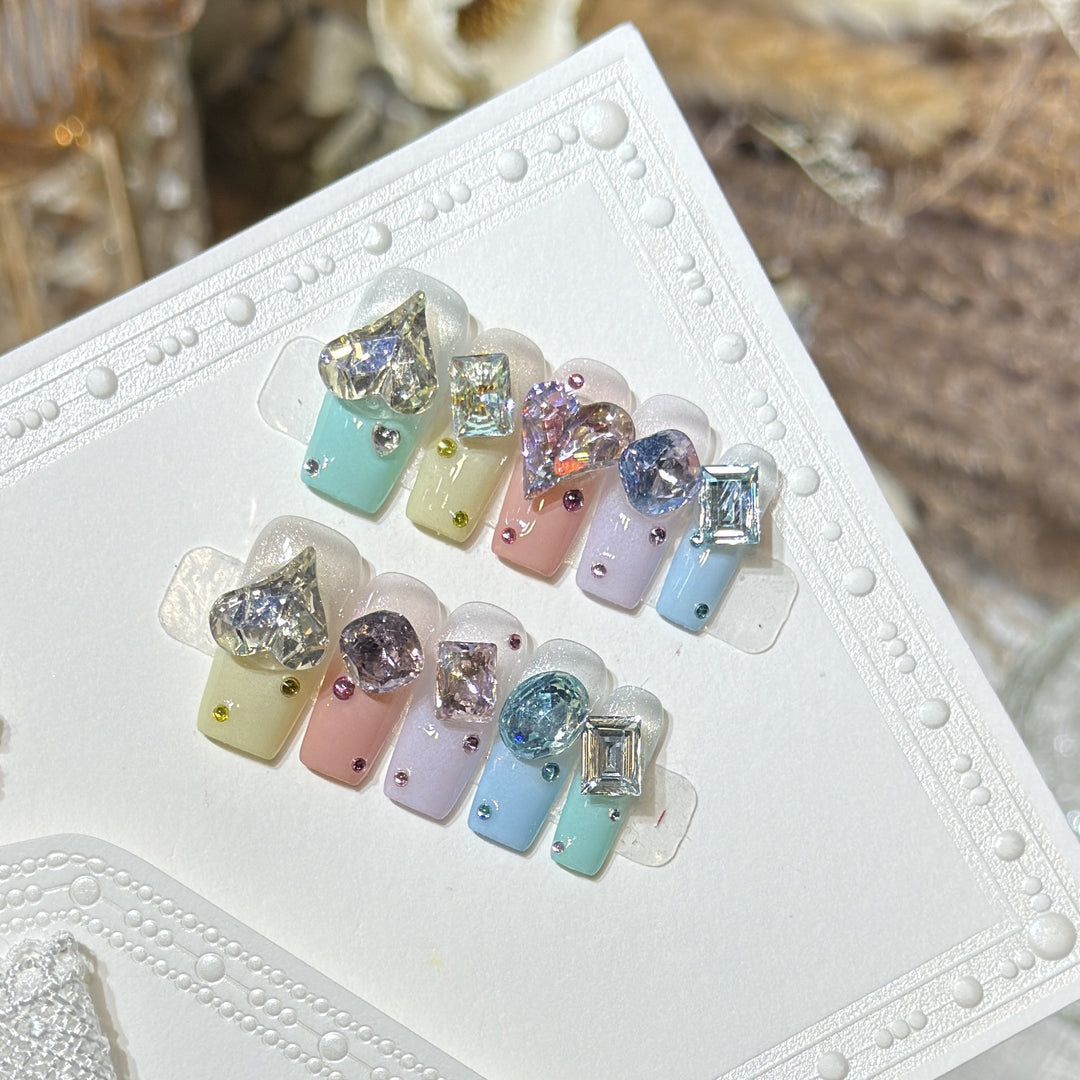 Artistic Press-On Nail Set with Gemstone Embellishments Bowlift