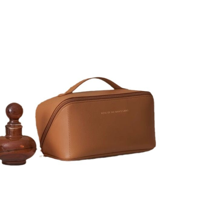 Cosmetic bag with multiple compartments and elegant design Bowlift