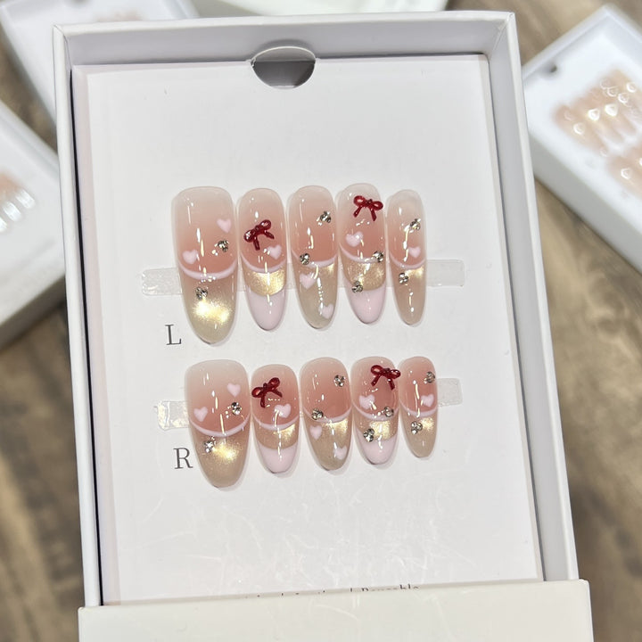 Decorative Press-On Nail Set with Heart and Bow Accents Bowlift