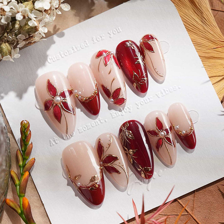 Glamorous artificial nail set with elegant floral and glitter details Bowlift