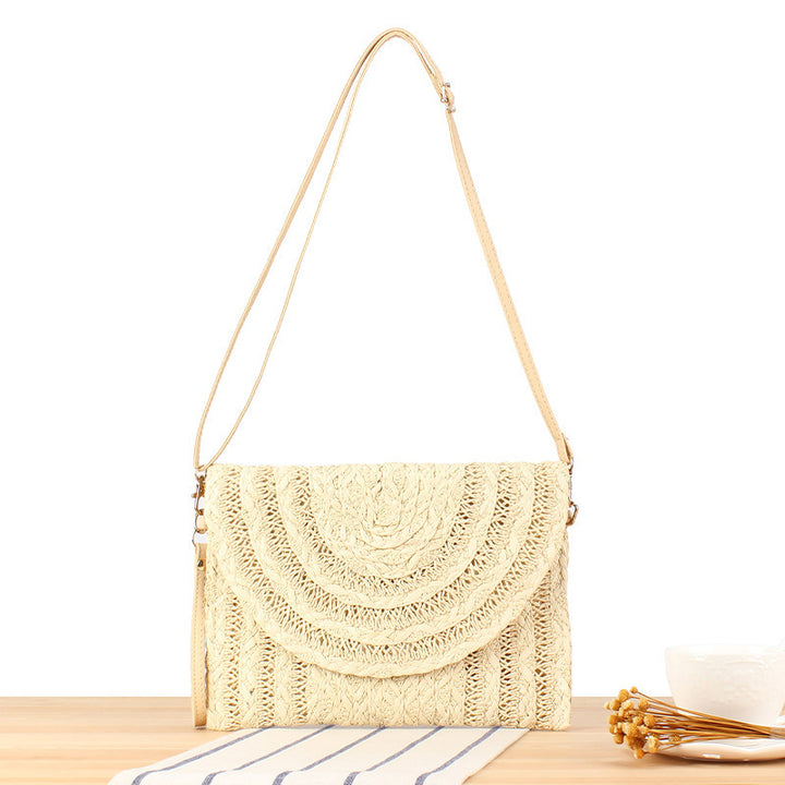 Shoulder bag made of high-quality woven natural material with elegant wave pattern Bowlift