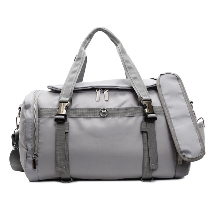Sporty travel bag with adjustable shoulder strap and several compartments Bowlift