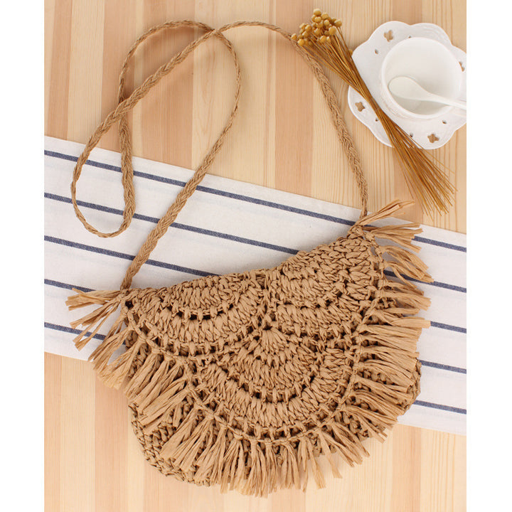 Handcrafted macrame shoulder bag with fringed design Bowlift