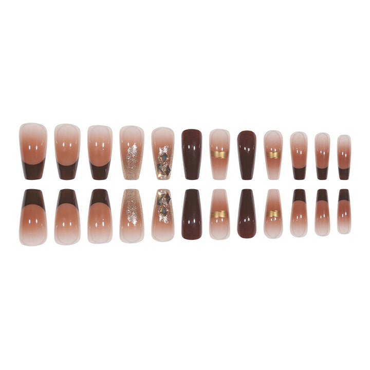 Elegant Long Press-On Nails with Decorative Gold Accents Bowlift
