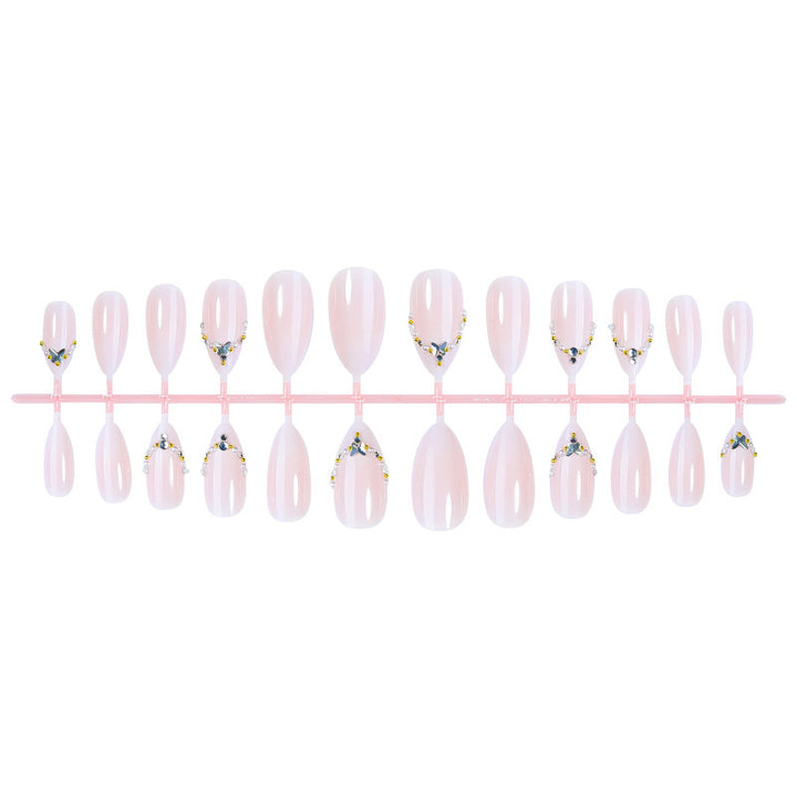 Acrylic nail set with elegant rhinestone decorations and glamorous designs Bowlift