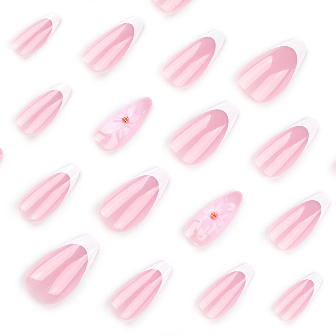 Artistic French-Tip Nail Extensions with Flower Accents Bowlift