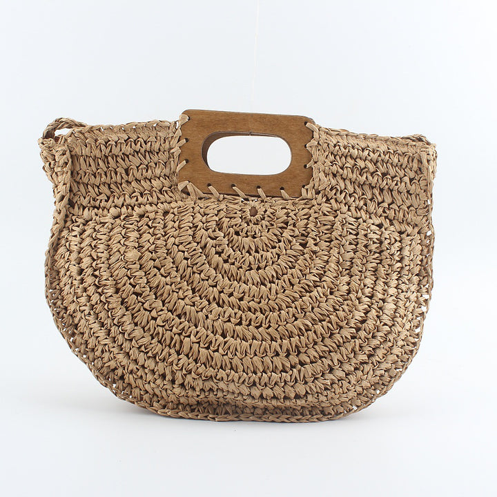 Handbag made of hand-woven natural material with stylish wooden handle Bowlift