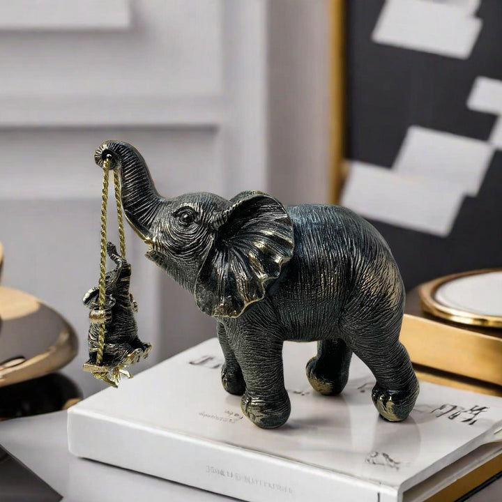 Decorative elephant figure with child Bowlift